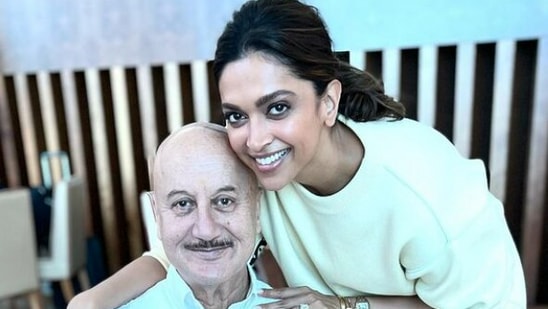 Anupam Kher runs into Deepika Padukone.