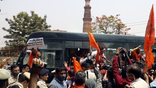 Police personnel detained members of right-wing organizations who were reciting Hanuman Chalisa outside Qutub Minar, demanding to rename the monument as 'Vishnu Stambh', in New Delhi.(Amit Sharma)