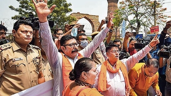 Members of right-wing organisations outside the Qutub Minar, on Tuesday..