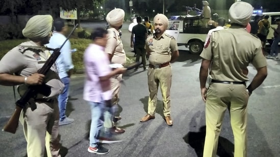 Mohali: Police personnel cordon off the area after a blast outside the Punjab Police's intelligence department office in Mohali, Monday, May 9, 2022. (PTI Photo)(PTI05_09_2022_000281B)(PTI)