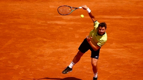 Switzerland's Stan Wawrinka in action during his first round match against Reilly Opelka(REUTERS)