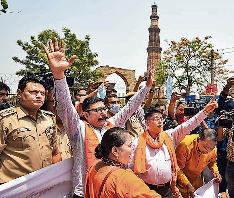 Members of right-wing organisations outside the Qutub Minar, on Tuesday.. Members of right-wing organisations outside the Qutub Minar, on Tuesday..