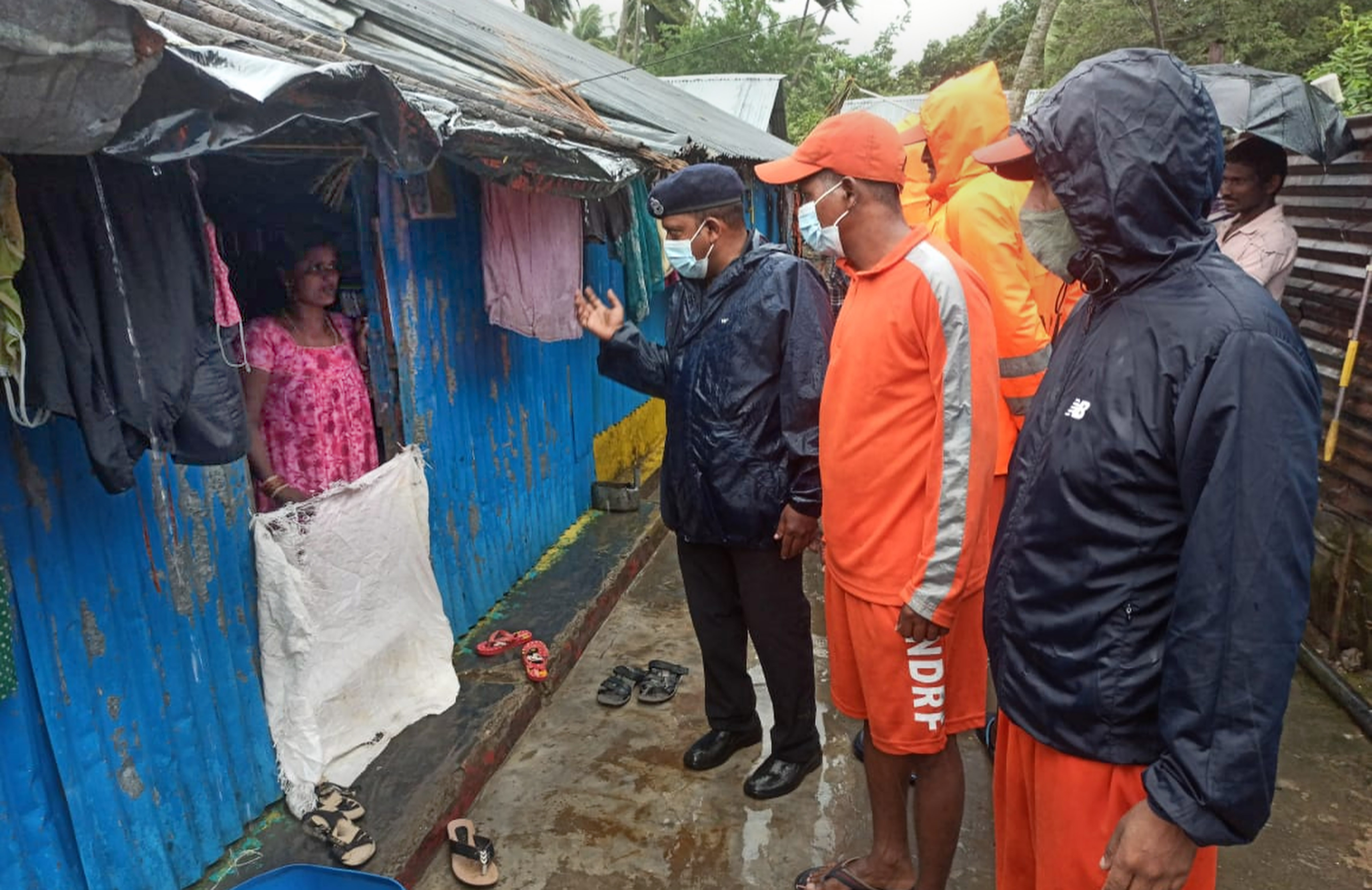 NDRF and police personnel at low lying areas of fishermen village in Andaman and Nicobar Islands. (PTI) NDRF and police personnel at low lying areas of fishermen village in Andaman and Nicobar Islands. (PTI)