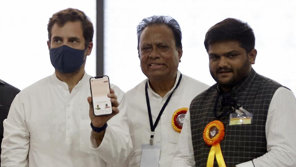 Congress leader Rahul Gandhi with Gujarat Pradesh Congress Committee President Jagdish Thakor and party leader Hardik Patel during the tribal convention, at Navjivan Arts and Commerce College ground in Dahod on Tuesday. (ANI) Congress leader Rahul Gandhi with Gujarat Pradesh Congress Committee President Jagdish Thakor and party leader Hardik Patel during the tribal convention, at Navjivan Arts and Commerce College ground in Dahod on Tuesday. (ANI)