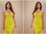 Yami Gautam is taking her fashion game to a whole new level and is surely doing justice to all her stylish picks. The actor, who was recently seen in Dasvi, recently stepped out wearing a yellow body-hugging dress.(Instagram/@vandafashionagency)