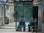 Security guards man a residential area under a Covid-19 coronavirus lockdown in Beijing. Security guards man a residential area under a Covid-19 coronavirus lockdown in Beijing. 