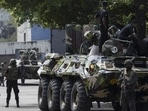 Sri Lankan army officers on patrol during a curfew in Colombo, Sri Lanka, on Wednesday, May 11, 2022.(Bloomberg) Sri Lankan army officers on patrol during a curfew in Colombo, Sri Lanka, on Wednesday, May 11, 2022.(Bloomberg)