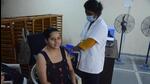 A beneficiary gets inoculated against Covid-19 in Thane on Wednesday. Praful Gangurde/HT Photo