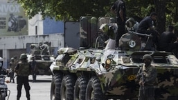 Sri Lankan army officers on patrol during a curfew in Colombo, Sri Lanka, on Wednesday, May 11, 2022.