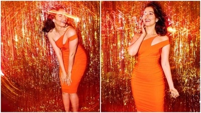 Tamannaah Bhatia earlier stepped out to promote her upcoming film F3 wearing an orange one shoulder midi dress. (Instagram/@tamannaahspeaks)