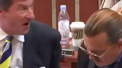Johnny Depp and his lawyer Ben Chew react as Amber Heard mentions Kate Moss in her testimony in the ongoing defamation trial. Johnny Depp and his lawyer Ben Chew react as Amber Heard mentions Kate Moss in her testimony in the ongoing defamation trial.
