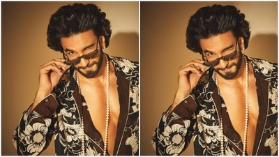 Ranveer looked ravishing in a maroon loungewear. He paired a full-sleeved coat with a pair of trousers. (Instagram/@ranveersingh)