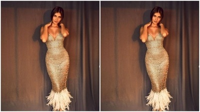 Tara played muse to fashion designer house Artine and picked a gold dress for the pictures. (Instagram/@tarasutaria)