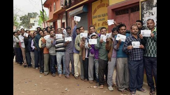 Voters wait in a long queue to cast their votes for Assembly elections, at a polling station in Dimapur, Nagaland , 2018 (PTI)