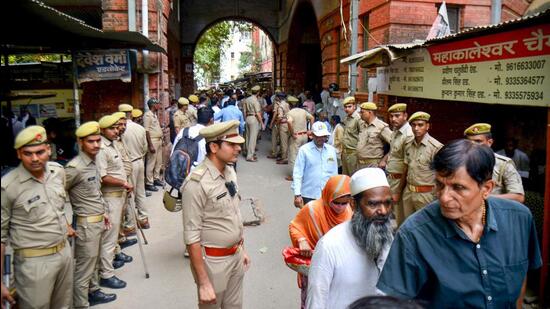 Security personnel outside the court during hearing of the Gyanvapi mosque survey case, in Varanasi on Tuesday. (PTI)