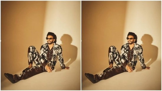 In black tinted shades and diamond ear studs, Ranveer sat on the floor and posed for the cameras.(Instagram/@ranveersingh)