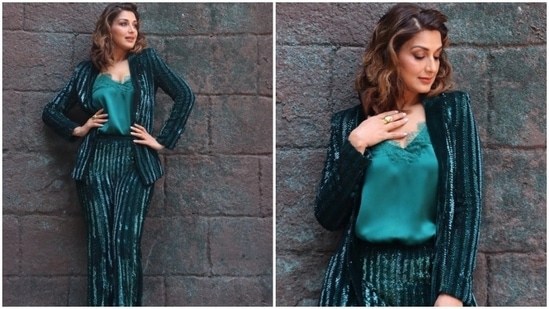 Sonali Bendre made a stylish statement in this emerald green pantsuit teamed with a satin lace top.(Instagram/@iamsonalibendre)
