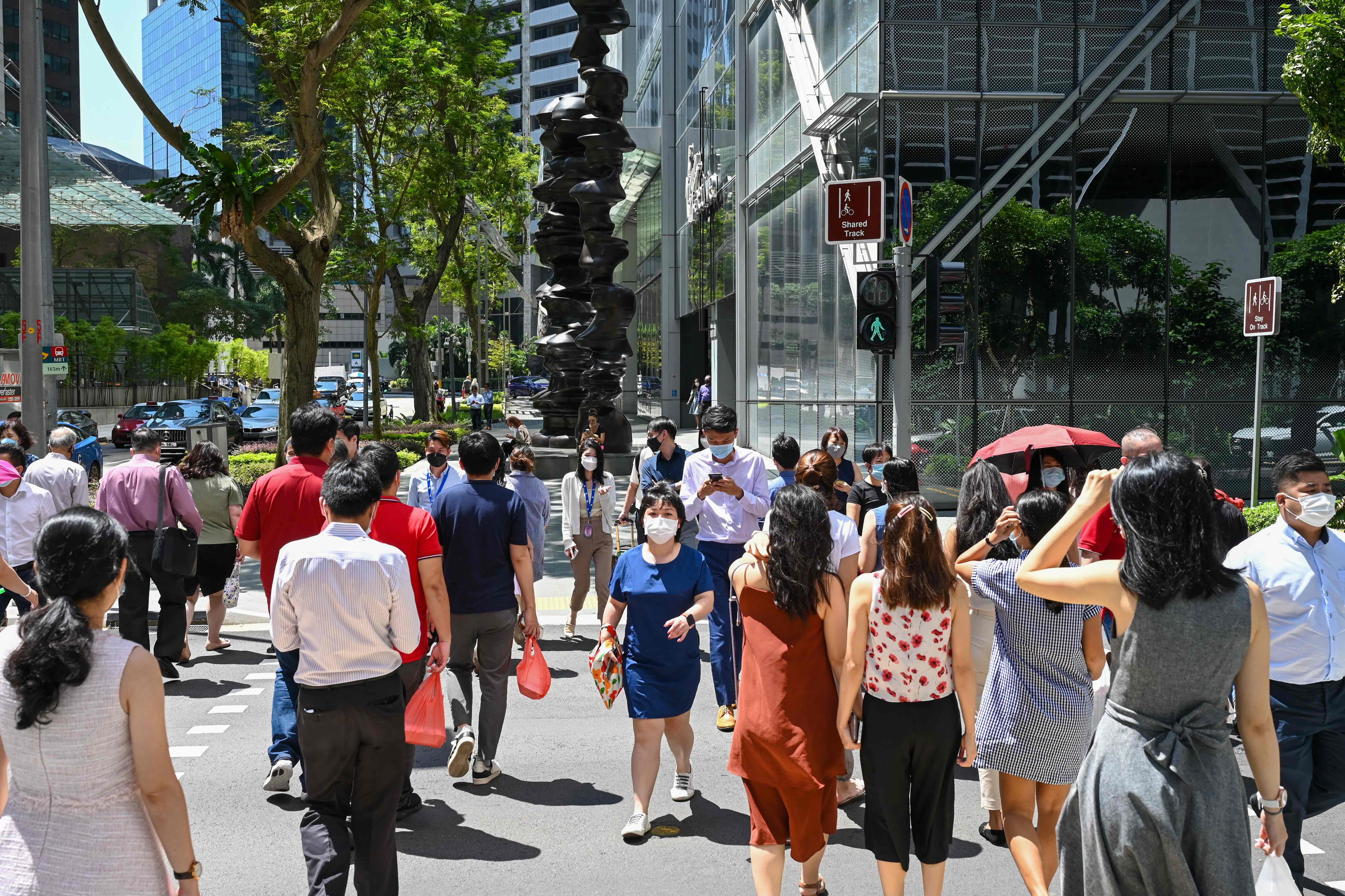 "Singapore adopts a strict zero-tolerance approach towards corruption," said CPIB. Anyone convicted of a corruption offence may be fined up to SGD 100,000, jailed for up to five years, or both. (Photo by Roslan RAHMAN/AFP)