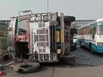 Gurugram, India-May 12: A truck overturned on the Delhi-Jaipur highway in Narsinghpur village near the foot-over bridge, in Gurugram, India, on Thursday, 12 May 2022. (Photo by Parveen Kumar/Hindustan Times)(Pic to go with Kartik Kumar's Story) Gurugram, India-May 12: A truck overturned on the Delhi-Jaipur highway in Narsinghpur village near the foot-over bridge, in Gurugram, India, on Thursday, 12 May 2022. (Photo by Parveen Kumar/Hindustan Times)(Pic to go with Kartik Kumar's Story)
