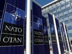 FILE PHOTO: Banners displaying the NATO logo are placed at the entrance of new NATO headquarters during the move to the new building, in Brussels, Belgium April 19, 2018. REUTERS/Yves Herman/File Photo(REUTERS)