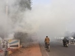 Waste being burnt in the open.(Sanjeev Verma/HT Photo)