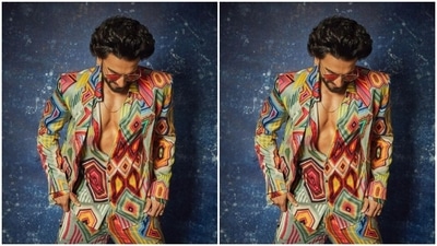 Ranveer showed off his attire for the day as he looked down. Jayeshbhai Jordaar is slated to release on May 13. (Instagram/@ranveersingh)