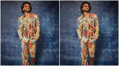 Ranveer’s shirt featured geometric patterns in multiple colours. He layered it with a blazer and a pair of trousers of the same print. (Instagram/@ranveersingh)