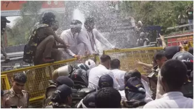 Police used water cannon to disperse the protesters. (Twitter/INC)