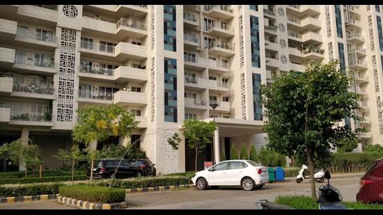 The firing took place outside Falcon View, a high-rise residential building owned by real estate baron and Aam Aadmi Party Mohali MLA Kulwant Singh, on Thursday morning. (HT Photo)
