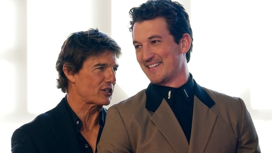 Tom Cruise, left, and Miles Teller, attend a red carpet event for the movie Top Gun: Maverick, in Mexico City.(AP)