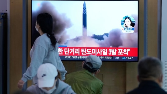 People watch a TV screen showing a news programme reporting about North Korea's missile launch with file footage, at a train station in Seoul, South Korea, Thursday, May 12, 2022. (AP/PTI) People watch a TV screen showing a news programme reporting about North Korea's missile launch with file footage, at a train station in Seoul, South Korea, Thursday, May 12, 2022. (AP/PTI)