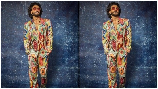Ranveer’s shirt featured geometric patterns in multiple colours. He layered it with a blazer and a pair of trousers of the same print.(Instagram/@ranveersingh)