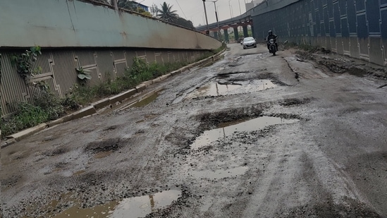 Potholes turn deadlier than ever before amid heavy showers in Bengaluru. (Source: Shruti Agrawal/Twitter) Potholes turn deadlier than ever before amid heavy showers in Bengaluru. (Source: Shruti Agrawal/Twitter)