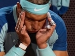 Rafael Nadal of Spain touches his head during his match against Denis Shapovalov of Canada at the Italian Open tennis tournament(AP) Rafael Nadal of Spain touches his head during his match against Denis Shapovalov of Canada at the Italian Open tennis tournament(AP)