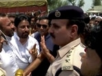 AAP MLA Amanatullah Khan at Madanpur Khadar Ward where SDMC undertakes an anti-encroachment drive, in New Delhi on Thursday (ANI Photo)