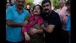 Rahul Bhat’s wife and daughter, who were putting up with him at Sheikhpora migrant colony in Budgam, accompanied the body as it arrived here from Kashmir. (AP) Rahul Bhat’s wife and daughter, who were putting up with him at Sheikhpora migrant colony in Budgam, accompanied the body as it arrived here from Kashmir. (AP)