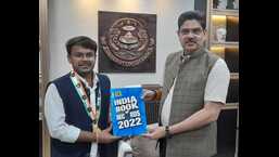 Divyansh Kumar Srivastava with LU vice chancellor prof Alok Kumar Rai. (Sourced)
