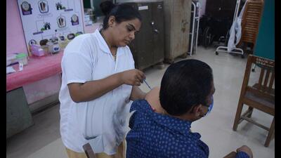 A beneficiary taking his booster dose against Covid in Thane. (PRAFUL GANGURDE/HT PHOTO) A beneficiary taking his booster dose against Covid in Thane. (PRAFUL GANGURDE/HT PHOTO)