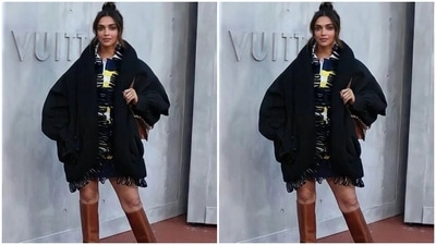 Deepika slipped into a collared mini dress designed by Ghesquière. It comes adorned in white, yellow and dark blue horizontally striped patterns with a wide white-coloured collar. (Instagram/@deepikapiku)