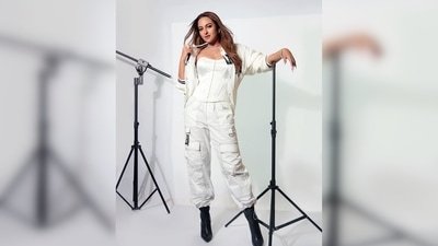 Sonakshi Sinha teamed her look with black pointed ankle boots and statement diamond jewellery. (Instagram/@eficientemanagement)