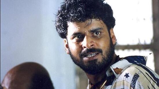 Manoj Bajpayee as Bhiku Mhatre in Satya (Satya film still) Manoj Bajpayee as Bhiku Mhatre in Satya (Satya film still)