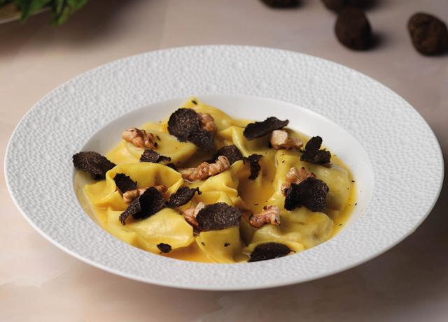 The potato and cauliflower faggotelli with spring onion, walnut and black truffle The potato and cauliflower faggotelli with spring onion, walnut and black truffle