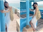 Ever since the gorgeous and talented Mouni Roy tied the knot with Dubai based businessman Suraj Nambiar, she has been constantly treating her Instagram family of more than 23.1 million with her travel. We finally get to see her husband in her latest Doha stills. For her beach day out, Mouni donned a white drawstring dress.(Instagram/@imouniroy)