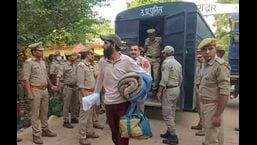 Detainees from J&K entering Naini Central jail on Saturday evening. (HT PHOTO)