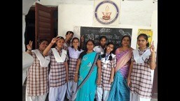 Girl students with their teacher in a government-aided secondary school of Prayagraj (HT file)