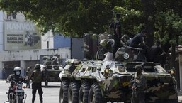 Sri Lankan army officers on patrol during a curfew in Colombo, Sri Lanka