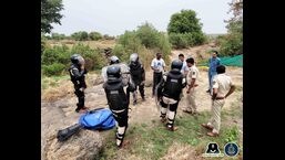 Wildlife SOS and forest department team is seen gearing up for the rescue operation. On Friday night, the leopard was successfully rescued after a 10-hour long operation (HT PHOTO)