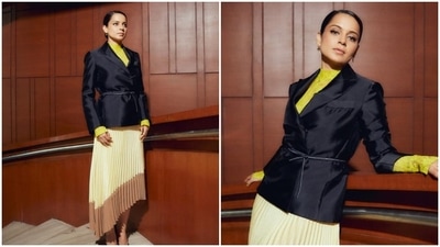Kangana Ranaut earlier attended a promotional event wearing a turtle neck top teamed with a pleated skirt and black blazer. (Instagram/@sukritigrover)
