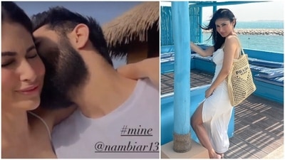 In a boomerang, Mouni Roy's husband Suraj Nambiar can be seen giving her a peck on her cheeks while she blushes. (Instagram/@imouniroy)