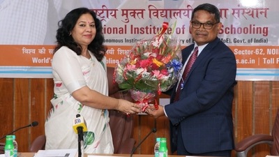 National Institute of Open Schooling chairperson Professor Saroj Sharma with Arun Kumar Sahu, the Indian high commissioner to Trinidad & Tobago. National Institute of Open Schooling chairperson Professor Saroj Sharma with Arun Kumar Sahu, the Indian high commissioner to Trinidad & Tobago.